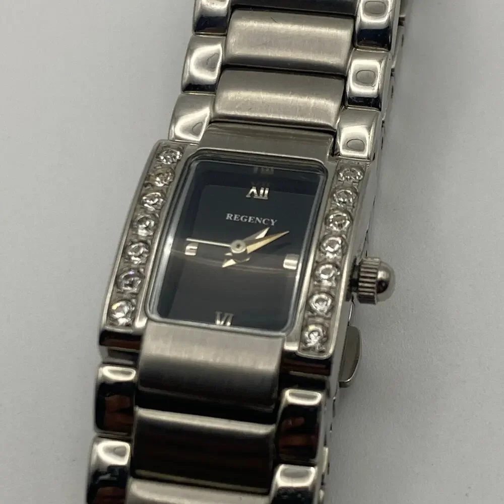 Elegant Ladies Regency Silver Tone Watch Black Dial Crystal Bezel